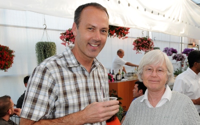 Photo shows Mark Gross on the left and Ellen Leue on the right at a celebration reception.
