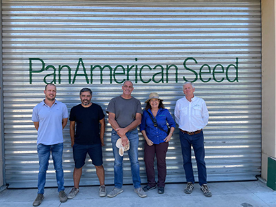 Group outside of PanAmerican Seed greenhouse in Chile