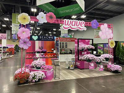 PanAmerican Seed booth decorated with colourful flowers