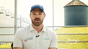 Marcus Jansen with a greenhouse in the background