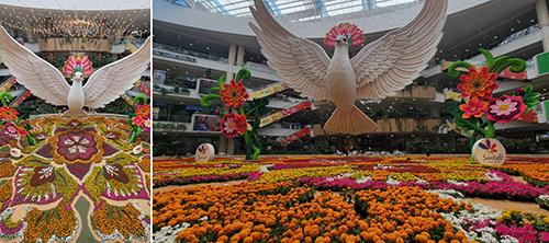 a carpet of colorful flowers in an atrium