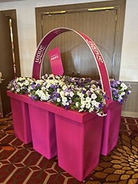 Life-sized hot pink flower container